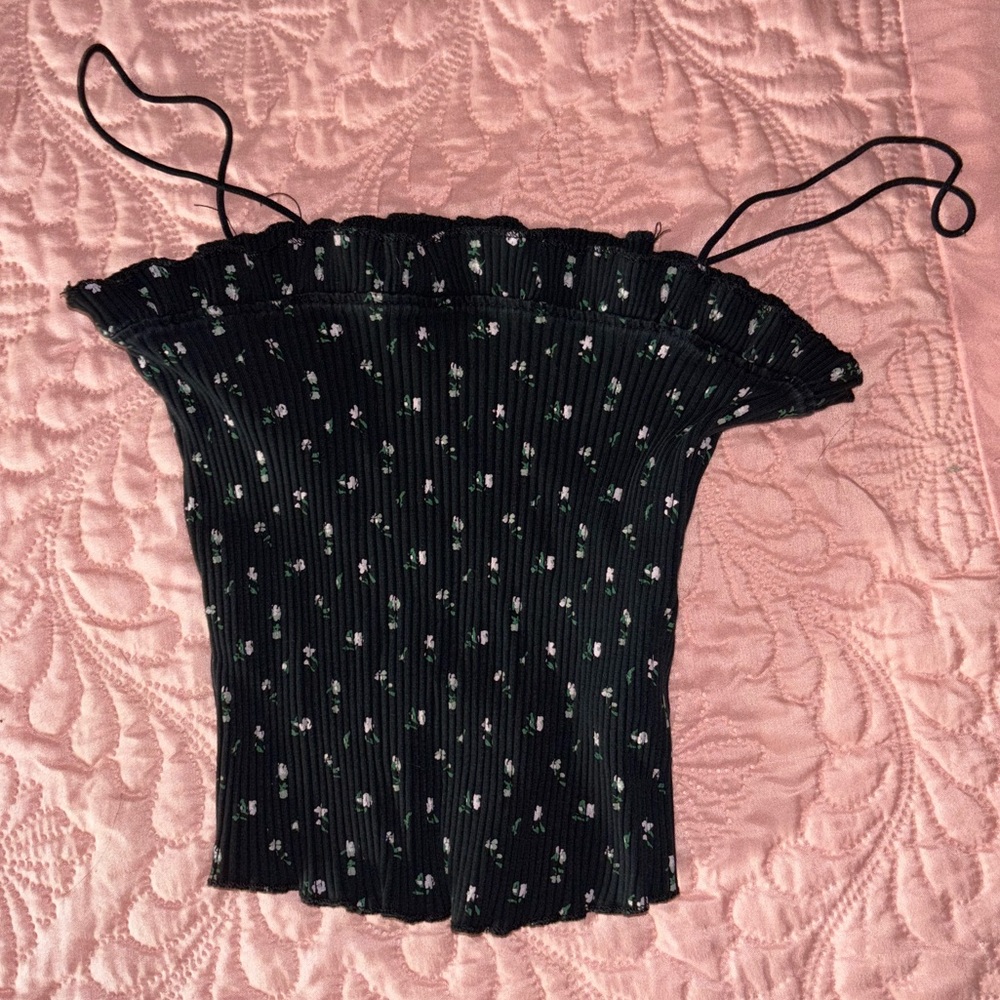 Two floral black and white tank tops